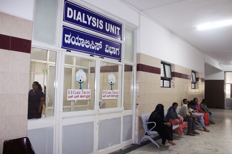 The SS Care Trust dialysis unit at the hospital, with people waiting in the corridor.