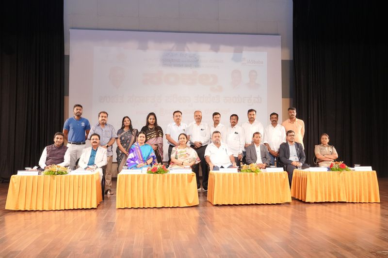 Guests seated on stage at the launch of Sankalpa.