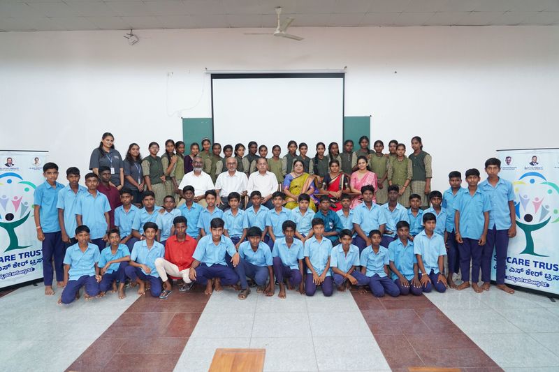 Large assembly of school students gathers with programme staff and guests for a Kaushalya session.
